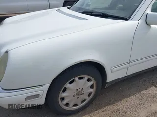 1998 Mercedes-Benz E-Class with VIN WDBJF65FXWA615255, listed as a IAAI auction lot 42146962 with 219,710 mi miles. Bid and sale history available at carsss.com. Image 6.