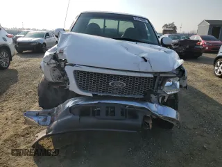 1999 Ford F-150 XL with VIN 1FTRX17L2XKC10123, listed as a Copart auction lot 83158894 with 57,446 mi miles and Salvage Title. Bid and sale history available at carsss.com. Image 5.