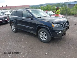 2017 Jeep Grand Cherokee Laredo with VIN 1C4RJFAG5HC891819, listed as a IAAI auction lot 42438396 with 82,780 mi miles and . Bid and sale history available at DreamBid. Image 1.