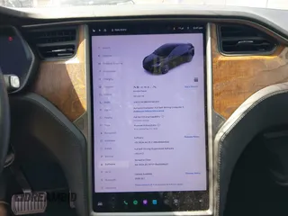 2019 Tesla Model X 75D with VIN 5YJXCBE21KF180203, listed as a IAAI auction lot 42190255 with 114,294 mi miles and . Bid and sale history available at carsss.com. Image 7.