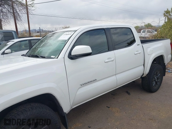 2021 Toyota Tacoma SR with VIN 3TYAX5GN6MT018475, listed as a IAAI auction lot 41966835 with 42,780 mi miles and . Bid and sale history available at DreamBid. Image 14.