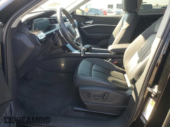 2019 Audi e-tron Premium Plus with VIN WA1LAAGE5KB023079, listed as a Copart auction lot 64977463 with 14,043 mi miles. Bid and sale history available at carsss.com. Image 7.
