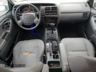2002 Chevrolet Tracker LT z VIN 2CNBJ634526917089, wystawiony jako Copart lot #79265434 z przebiegiem 131 081 mil mil oraz Czysty tytuł • Clean title. Historia ofert i sprzedaży dostępna na DreamBid. Obrazek 8.