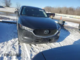 2020 Mazda CX-5 Touring with VIN JM3KFBCMXL1757348, listed as a Copart auction lot 45495665 with 79,890 mi miles and Salvage Title. Bid and sale history available at carsss.com. Image 5.