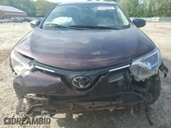 2018 Toyota RAV4 LE with VIN 2T3BFREV4JW825326, listed as a Copart auction lot 57245275 with 137,441 mi miles and Salvage title. Bid and sale history available at DreamBid. Image 5.