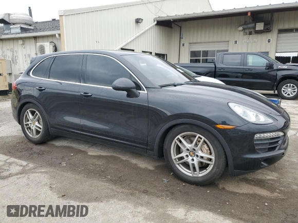 2014 Porsche Cayenne S with VIN WP1AB2A25ELA58233, listed as a Copart auction lot 52733455 with 144,344 mi miles and Clean title. Bid and sale history available at DreamBid. Image 4.