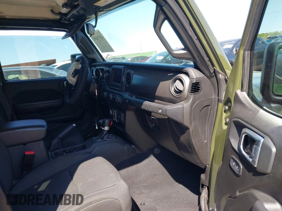 2023 Jeep Wrangler Sport S with VIN 1C4HJXDN0PW695795, listed as a IAAI auction lot 41974691 with 32,734 mi miles and . Bid and sale history available at DreamBid. Image 5.