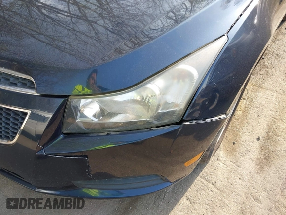 2014 Chevrolet Cruze 1LT with VIN 1G1PC5SB1E7302745, listed as a IAAI auction lot 42142048 with 160,000 mi miles and . Bid and sale history available at DreamBid. Image 6.