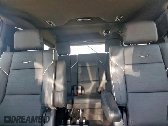 2023 Cadillac Escalade z VIN 1GYS3KKL9PR262067, wystawiony jako Copart lot #59101095 z przebiegiem 43 884 mil mil oraz Szkody całkowita. Historia ofert i sprzedaży dostępna na DreamBid. Obrazek 10.