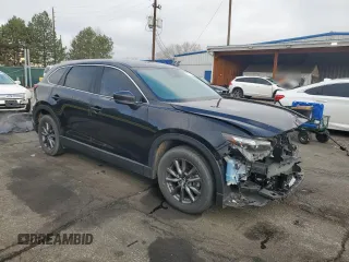 2023 Mazda CX-9 Touring with VIN JM3TCBCY4P0653899, listed as a Copart auction lot 50999985 with 32,896 mi miles and Salvage title. Bid and sale history available at DreamBid. Image 4.