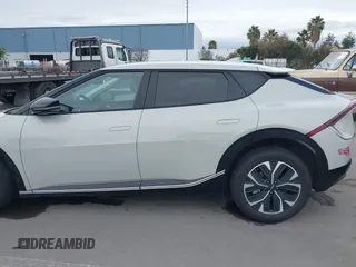 2022 Kia EV6 Wind with VIN KNDC34LA9N5043553, listed as a IAAI auction lot 41576789 with 133,401 mi miles and . Bid and sale history available at DreamBid. Image 14.