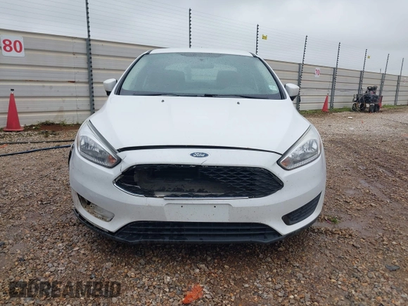 2018 Ford Focus SE z VIN 1FADP3F23JL225333, wystawiony jako IAAI lot #41758445 z przebiegiem 133 307 mil mil oraz . Historia ofert i sprzedaży dostępna na DreamBid. Obrazek 12.