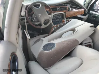 1999 Jaguar XJ with VIN SAJKX6049XC854232, listed as a Copart auction lot 76191414 with 0 mi miles and Salvage Title. Bid and sale history available at carsss.com. Image 8.