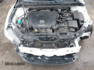 2015 Mazda 6 i Sport with VIN JM1GJ1U50F1220703, listed as a IAAI auction lot 41475129 with 127,834 mi miles. Bid and sale history available at carsss.com. Image 10.