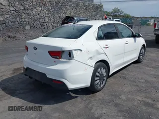 2019 Kia Rio S with VIN 3KPA24AB9KE214579, listed as a IAAI auction lot 41764485 with 82,231 mi miles. Bid and sale history available at carsss.com. Image 6.