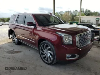 2016 GMC Yukon Denali with VIN 1GKS1CKJ9GR246441, listed as a Copart auction lot 51876925 with 158,323 mi miles and Salvage Title. Bid and sale history available at DreamBid. Image 4.