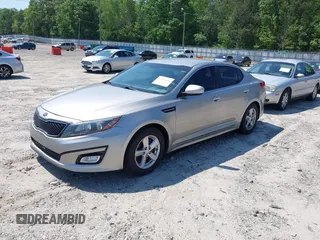 2014 Kia Optima LX with VIN KNAGM4A79E5470198, listed as a IAAI auction lot 42142484 with 169,140 mi miles. Bid and sale history available at carsss.com. Image 2.
