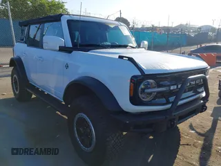 2021 Ford Bronco with VIN 1FMEE5DP7MLA93692, listed as a IAAI auction lot 42222219 with 18,982 mi miles and . Bid and sale history available at DreamBid. Image 1.