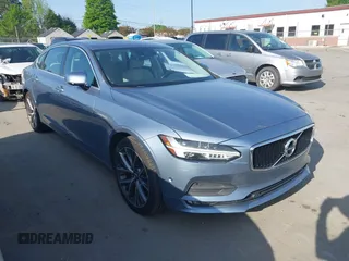 2018 Volvo S90 Momentum z VIN LVY982AK0JP007222, wystawiony jako IAAI lot #42024457 z przebiegiem 134 281 mil mil oraz . Historia ofert i sprzedaży dostępna na DreamBid. Obrazek 1.
