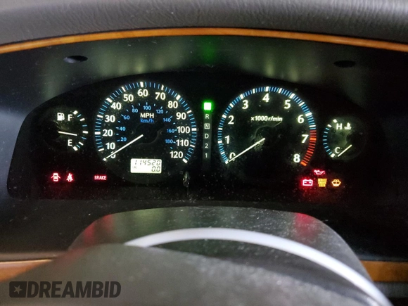 2001 Infiniti QX4 with VIN JNRDR09X21W204448, listed as a Copart auction lot 82619574 with 114,520 mi miles and Salvage Title. Bid and sale history available at DreamBid. Image 9.