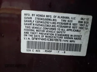 2012 Honda Pilot EX-L z VIN 5FNYF4H51CB070976, wystawiony jako Copart lot #73470204 z przebiegiem 223 572 mil mil oraz Szkoda całkowita • Salvage title. Historia ofert i sprzedaży dostępna na DreamBid. Obrazek 15.