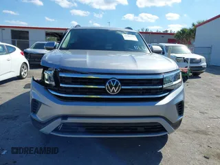 2022 Volkswagen Atlas SE z VIN 1V2HR2CA9NC518394, wystawiony jako IAAI lot #41702134 z przebiegiem 28 685 mil mil oraz . Historia ofert i sprzedaży dostępna na DreamBid. Obrazek 13.