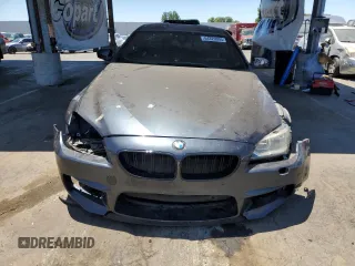 2014 BMW M6 z VIN WBSLX9C52ED160538, wystawiony jako Copart lot #64329095 z przebiegiem Nie podano mil oraz Szkoda całkowita • Salvage title. Historia ofert i sprzedaży dostępna na DreamBid. Obrazek 5.