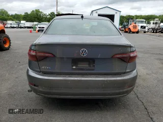 2019 Volkswagen Jetta S с VIN 3VWC57BU4KM121991, выставлен на аукционе Copart как лот 58519085 с пробегом 73 552 миль миль и На запчасти • Non repairable. История ставок и продаж доступна на DreamBid. Изображение 6.
