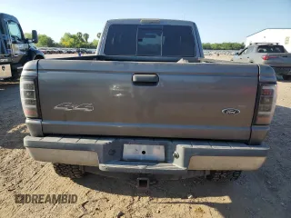 2004 Ford Ranger XL Fleet with VIN 1FTZR45E04PB59106, listed as a Copart auction lot 52477525 with 330,703 mi miles and Salvage title. Bid and sale history available at DreamBid. Image 6.