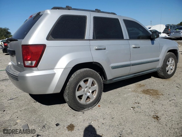 2009 Jeep Grand Cherokee Laredo with VIN 1J8GS48KX9C514254, listed as a Copart auction lot 49809175 with 293,040 mi miles and Salvage Title. Bid and sale history available at carsss.com. Image 3.