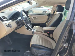 2013 Volkswagen CC Sport Plus z VIN WVWBP7AN1DE541221, wystawiony jako Copart lot #57398645 z przebiegiem 133 505 mil mil oraz Szkoda całkowita • Salvage title. Historia ofert i sprzedaży dostępna na DreamBid. Obrazek 7.