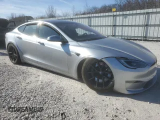 2024 Tesla Model S с VIN 5YJSA1E56RF541102, выставлен на аукционе Copart как лот 42584275 с пробегом Не указан миль и Списание • Salvage title. История ставок и продаж доступна на DreamBid. Изображение 4.