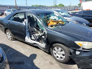 2004 Toyota Camry LE with VIN 4T1BE32K54U270040, listed as a IAAI auction lot 41984769 with Not provided miles and . Bid and sale history available at DreamBid. Image 13.
