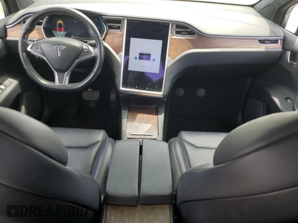 2017 Tesla Model X 90D with VIN 5YJXCAE26HF079421, listed as a Copart auction lot 47889005 with 88,281 mi miles and Salvage Title. Bid and sale history available at DreamBid. Image 8.