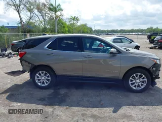 2019 Chevrolet Equinox LT z VIN 3GNAXKEVXKS586516, wystawiony jako IAAI lot #42323792 z przebiegiem 53 710 mil mil oraz . Historia ofert i sprzedaży dostępna na DreamBid. Obrazek 14.