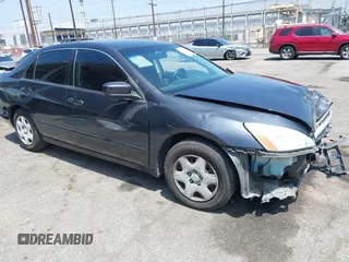 2006 Honda Accord LX with VIN 1HGCM56476A067563, listed as a IAAI auction lot 42363590 with 220,686 mi miles and . Bid and sale history available at DreamBid. Image 1.