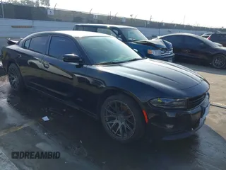 2017 Dodge Charger SE with VIN 2C3CDXBG8HH515103, listed as a IAAI auction lot 41599588 with 128,805 mi miles. Bid and sale history available at carsss.com. Image 1.