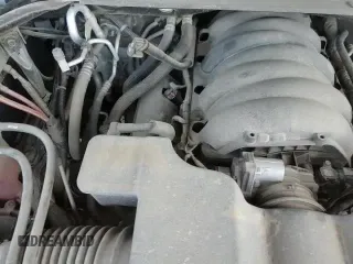 2019 Chevrolet Suburban LT with VIN 1GNSKHKCXKR405488, listed as a Copart auction lot 57905295 with 147,618 mi miles and Salvage title. Bid and sale history available at DreamBid. Image 14.