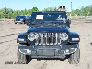 2023 Jeep Wrangler Sahara z VIN 1C4JJXP60PW627051, wystawiony jako IAAI lot #42290712 z przebiegiem 28 269 mil mil oraz . Historia ofert i sprzedaży dostępna na DreamBid. Obrazek 13.