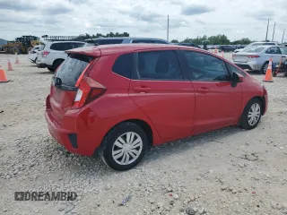 2015 Honda Fit LX z VIN 3HGGK5H55FM775973, wystawiony jako Copart lot #56454685 z przebiegiem 96 167 mil mil oraz Szkoda całkowita • Salvage title. Historia ofert i sprzedaży dostępna na DreamBid. Obrazek 3.
