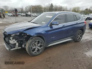 2017 BMW X1 xDrive28i with VIN WBXHT3C3XH5F69573, listed as a Copart auction lot 52719715 with 93,981 mi miles and Salvage Title. Bid and sale history available at carsss.com. Image 1.