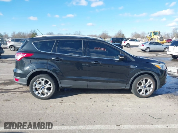 2015 Ford Escape Titanium with VIN 1FMCU0JX8FUC34459, listed as a IAAI auction lot 41394012 with 154,077 mi miles. Bid and sale history available at carsss.com. Image 13.