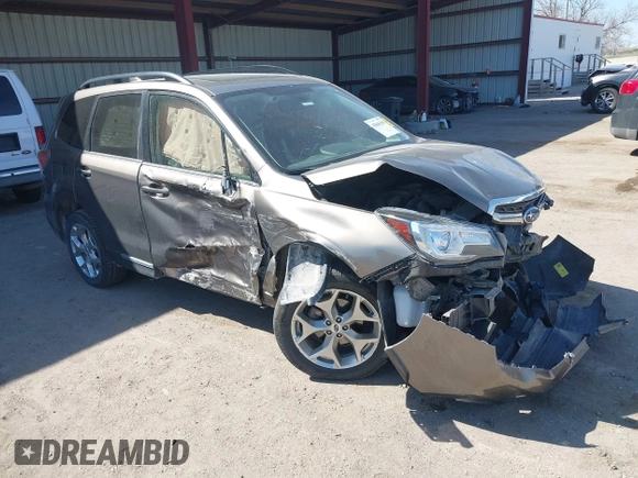 2017 Subaru Forester Touring z VIN JF2SJAWC8HH582683, wystawiony jako IAAI lot #42046369 z przebiegiem 71 070 mil mil oraz . Historia ofert i sprzedaży dostępna na DreamBid. Obrazek 1.