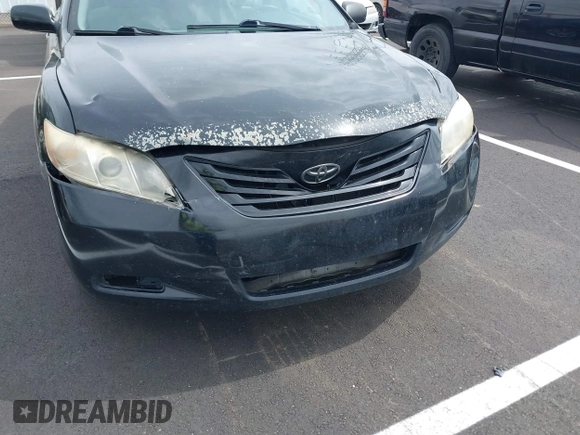 2007 Toyota Camry CE with VIN JTNBE46K473057431, listed as a IAAI auction lot 41941811 with 245,059 mi miles and . Bid and sale history available at DreamBid. Image 6.