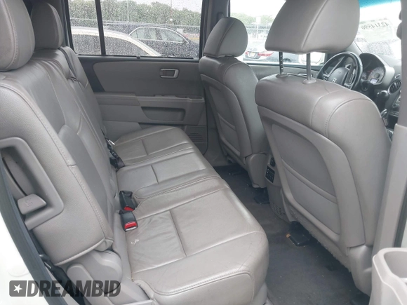 2013 Honda Pilot Touring with VIN 5FNYF4H96DB016044, listed as a IAAI auction lot 42314590 with 183,913 mi miles and . Bid and sale history available at DreamBid. Image 8.