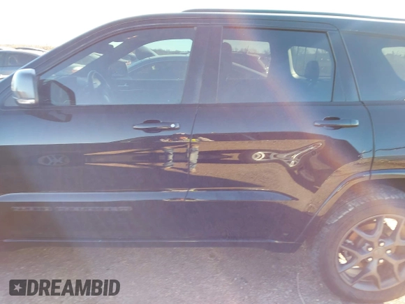 2021 Jeep Grand Cherokee 80th Anniversary with VIN 1C4RJFBG9MC527654, listed as a IAAI auction lot 41212055 with 92,436 mi miles and . Bid and sale history available at DreamBid. Image 14.