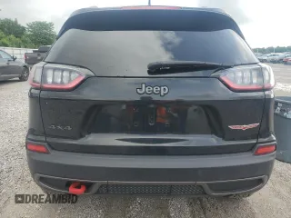 2019 Jeep Cherokee Trailhawk with VIN 1C4PJMBX9KD183116, listed as a Copart auction lot 58518265 with 124,258 mi miles and Salvage title. Bid and sale history available at DreamBid. Image 6.