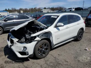 2018 BMW X1 xDrive28i with VIN WBXHT3C30J5F92074, listed as a Copart auction lot 51069535 with 116,381 mi miles and Salvage Title. Bid and sale history available at carsss.com. Image 1.