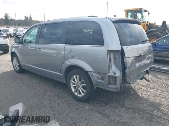 2019 Dodge Grand Caravan SXT with VIN 2C4RDGCG0KR786940, listed as a IAAI auction lot 41648332 with 96,427 mi miles and . Bid and sale history available at DreamBid. Image 3.