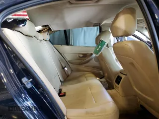 2014 BMW 3 Series 320i with VIN WBA3B1G5XENT00747, listed as a Copart auction lot 64737935 with 123,374 mi miles and Salvage title. Bid and sale history available at DreamBid. Image 10.